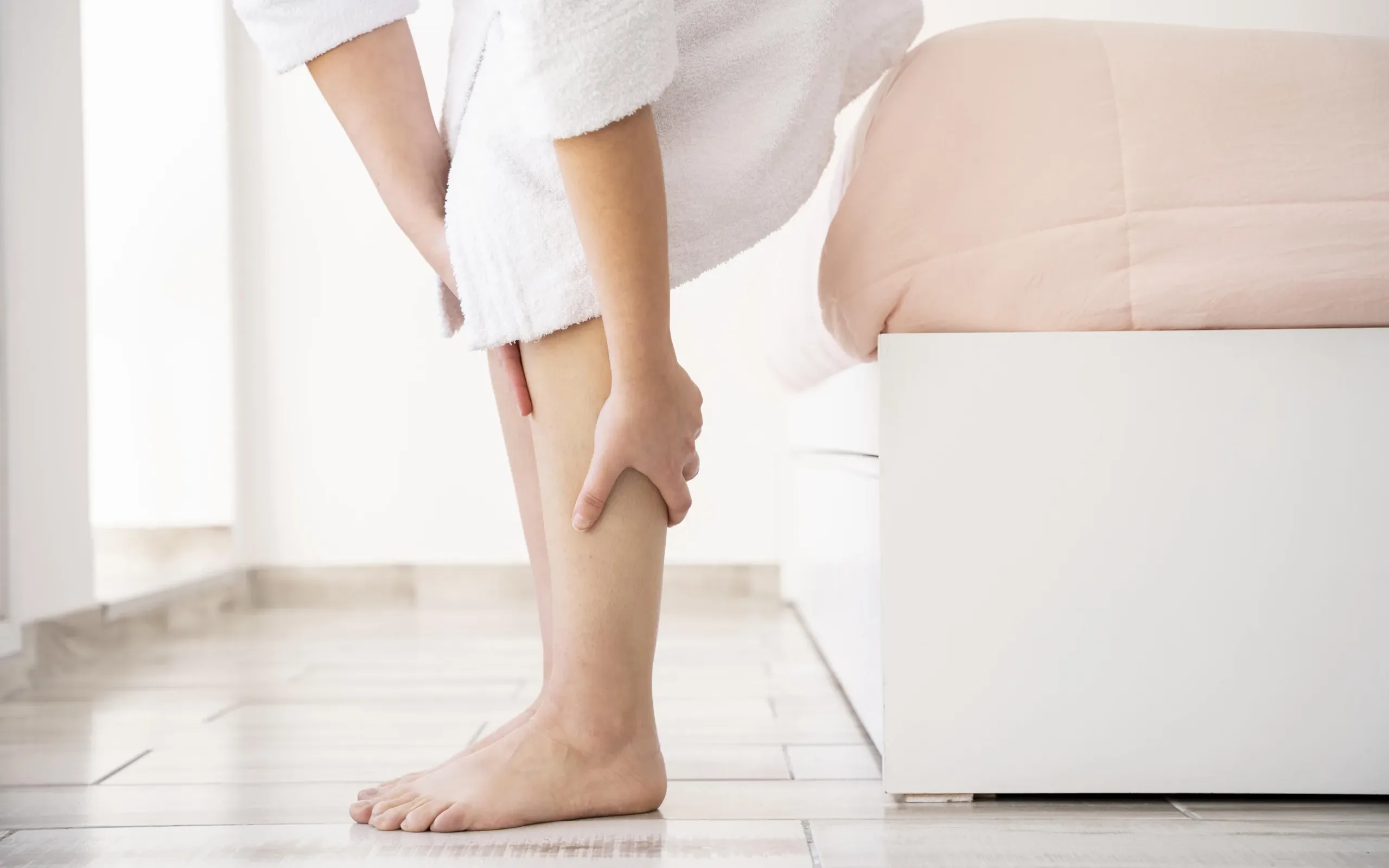 close-up-hands-massaging-legs
